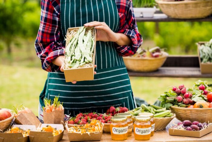 woman selling organic food items