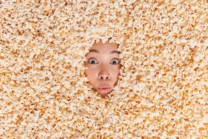 woman buried in popcorn