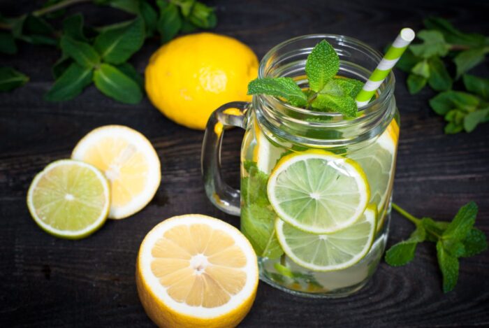 glass of lemon water with mint
