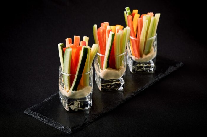 vegetable sticks in glasses