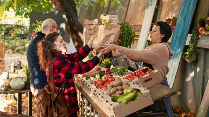 buying food from a local farmer