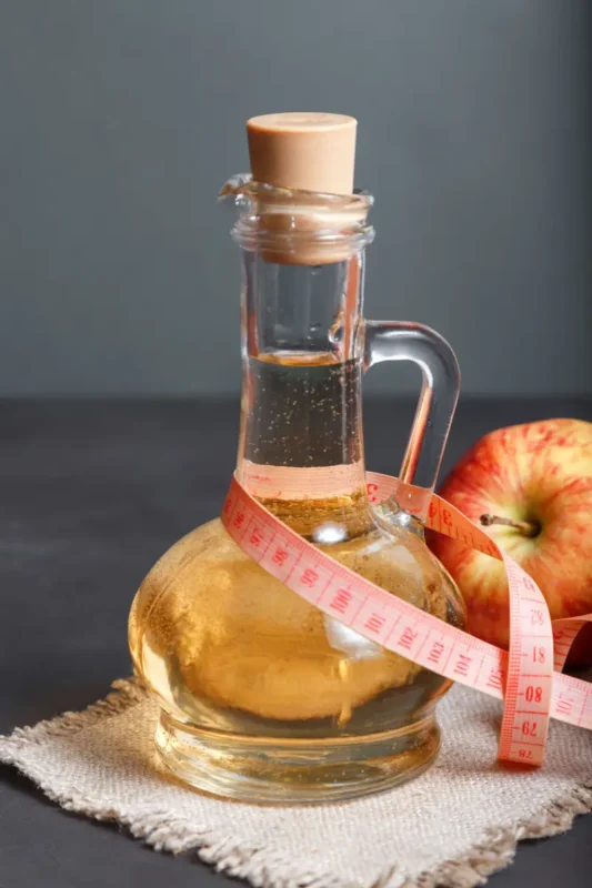 bottle of Apple Cider Vinegar on table